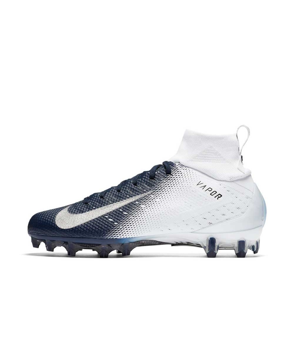 navy blue and white cleats