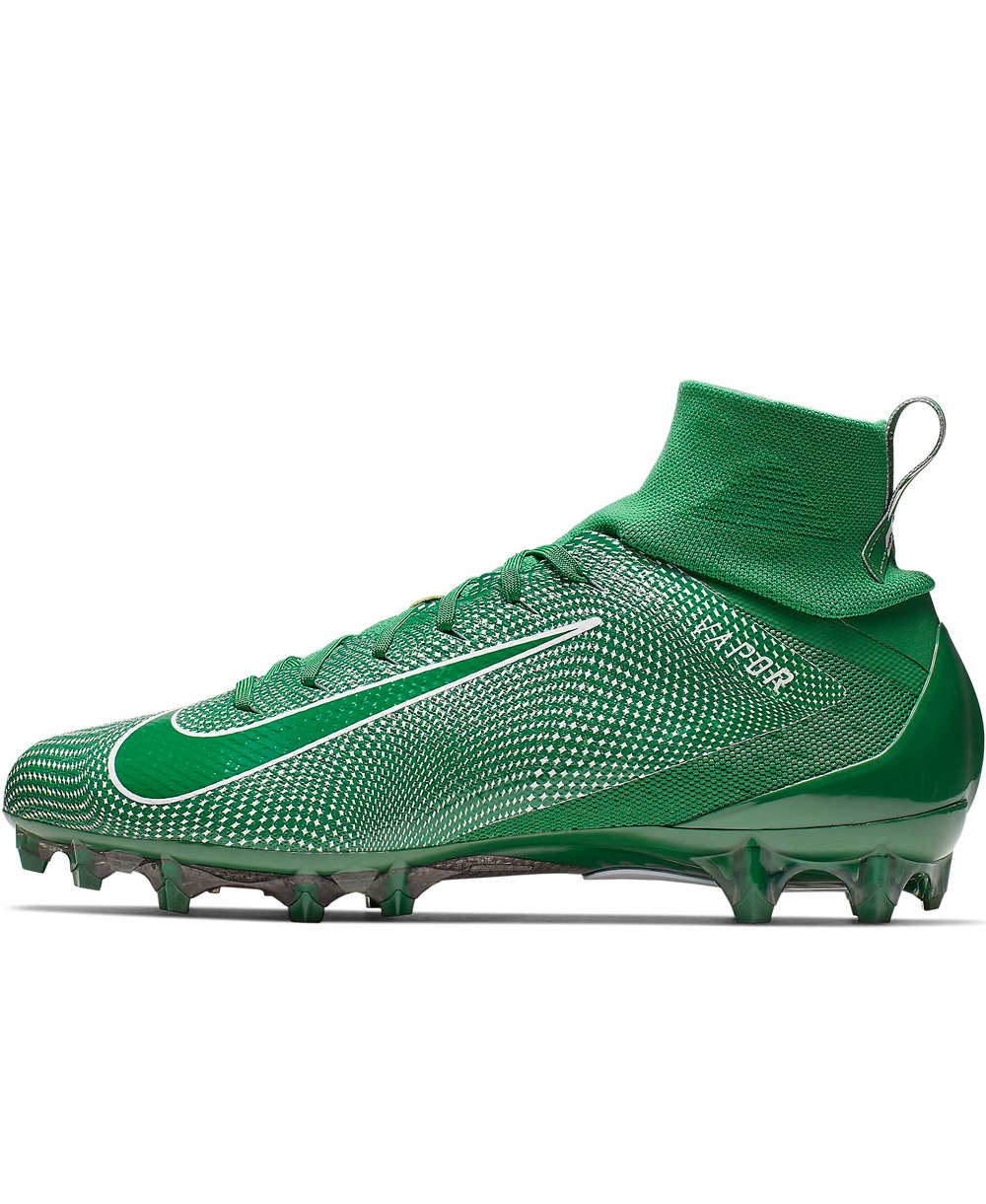 green and white football cleats