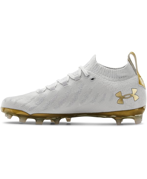 white and gold football cleats